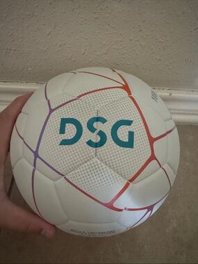 DSG White Soccer Ball with Teal Logo and Orange-Purple Gradient Panels
